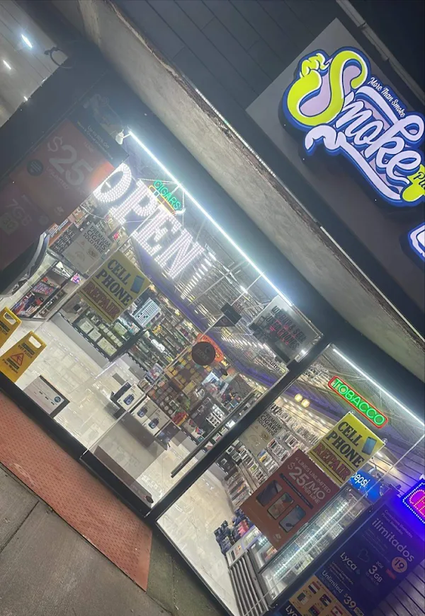 The shop lit up at night