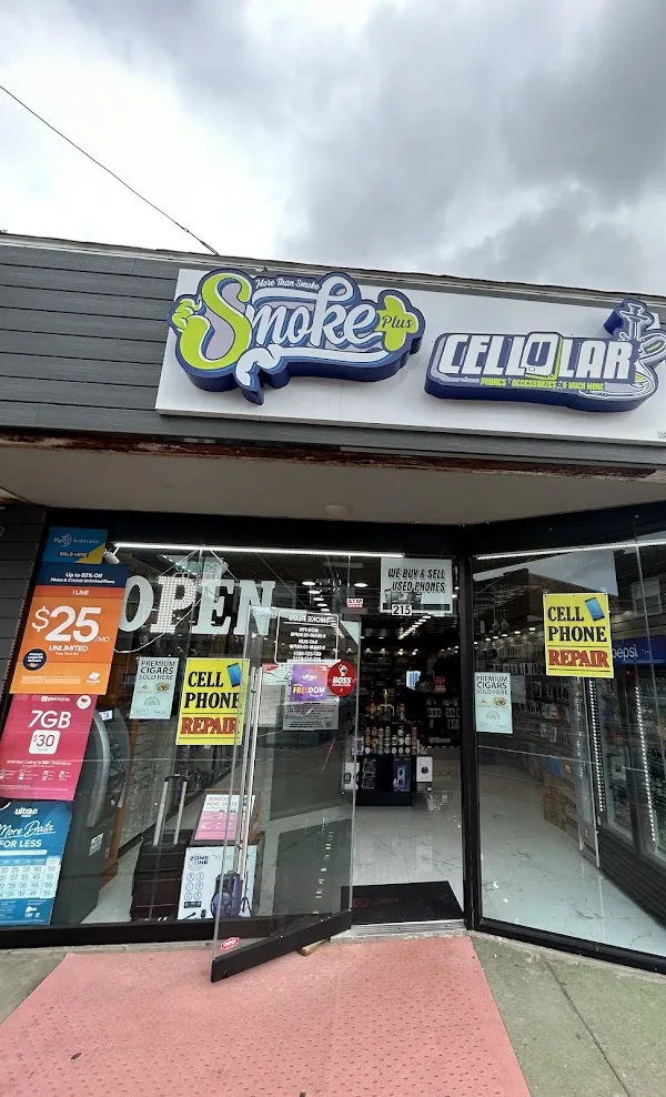 Smoke Plus Cellular storefront on Main Street, Johnson City